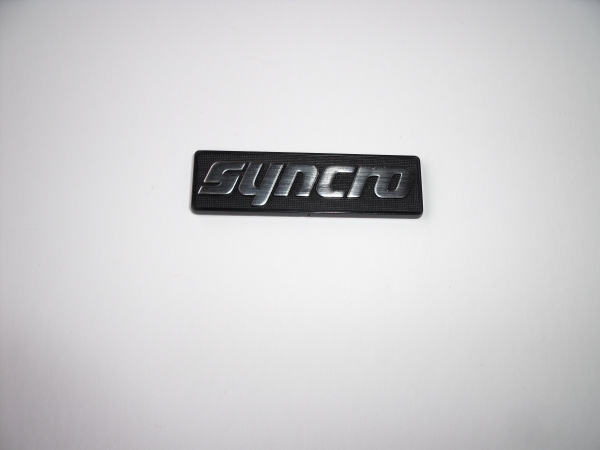 Original " syncro " Emblem für Armaturenbrett 191 853 691 GX2  Golf 2